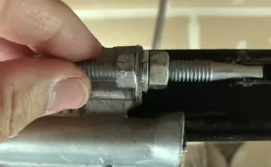 Hold the internal nut steadily