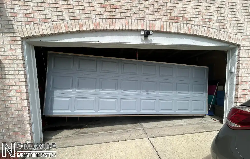 Sandys Garage Door Broken Need Repair - Before Image